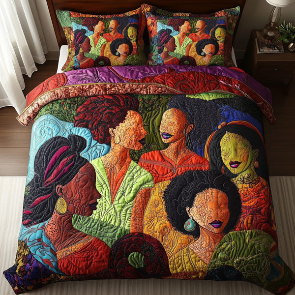 Juneteenth quilted 3-piece bedding set on a made bed in a warmly lit bedroom
