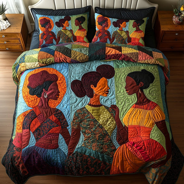 Juneteenth quilted 3-piece bedding set on a made bed in a warmly lit bedroom