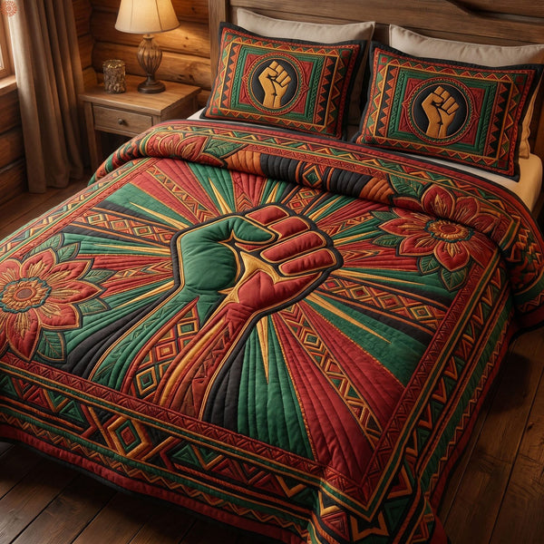Juneteenth Soul quilted 3-piece bedding set on a made bed in a warmly lit bedroom