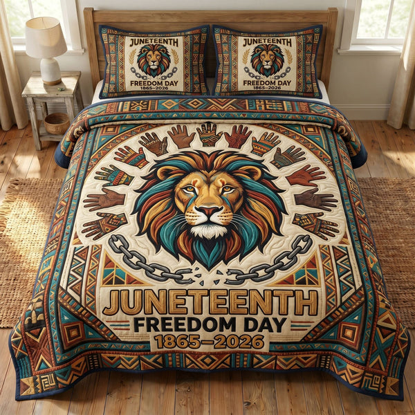 Juneteenth Soul quilted 3-piece bedding set on a made bed in a warmly lit bedroom