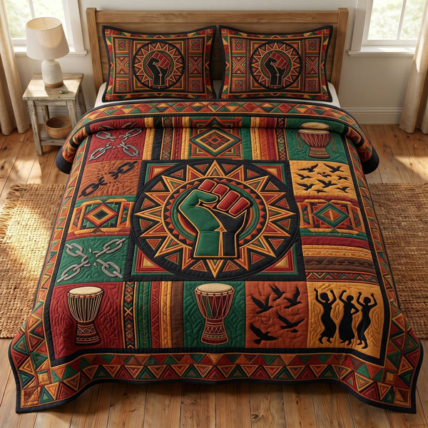 Juneteenth Soul quilted 3-piece bedding set on a made bed in a warmly lit bedroom