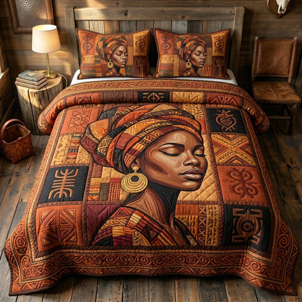 Juneteenth Soul quilted 3-piece bedding set on a made bed in a warmly lit bedroom