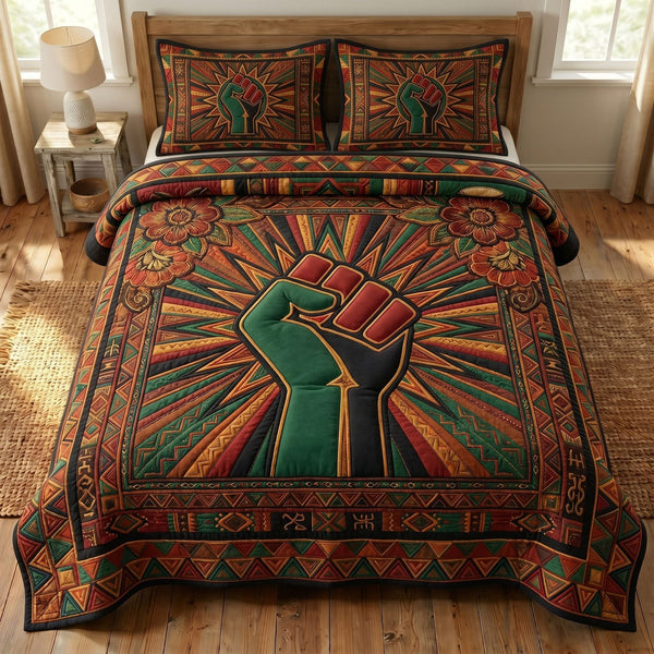 Juneteenth Soul quilted 3-piece bedding set on a made bed in a warmly lit bedroom