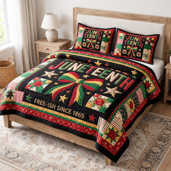 Juneteenth Spirit quilted 3-piece bedding set on a made bed in a warmly lit bedroom