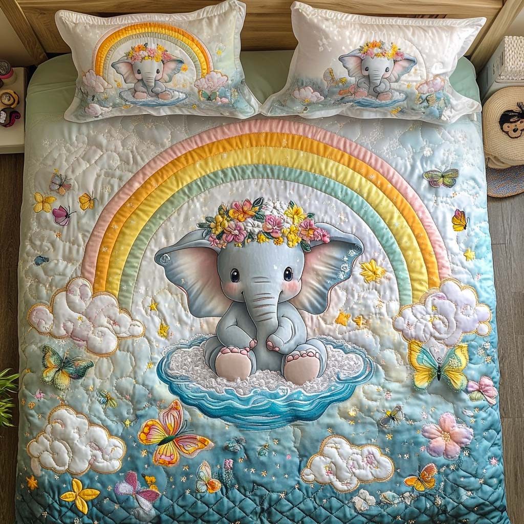 Jungle Elephant quilted 3-piece bedding set on a made bed with two matching pillow shams