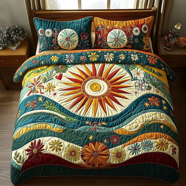 Kaleido Sun quilted 3-piece bedding set on a made bed with two matching pillow shams