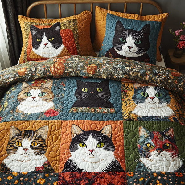 KaleidoCats quilted 3-piece bedding set on a made bed with two matching pillow shams