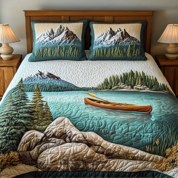 Kayak Escape quilted 3-piece bedding set on a made bed with two matching pillow shams