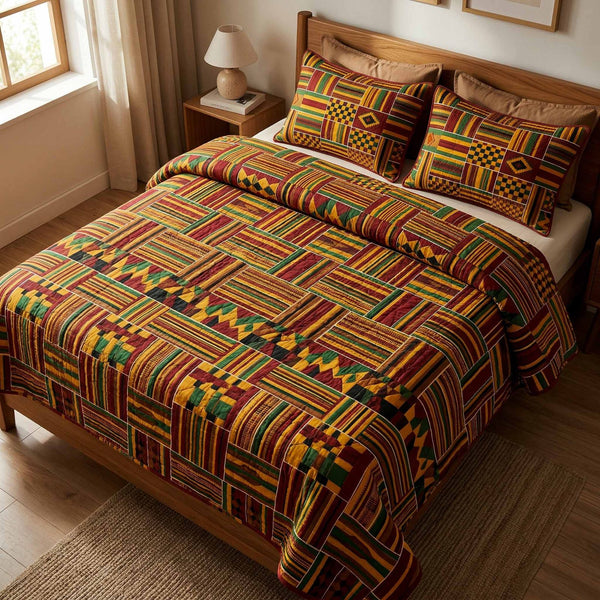 Kente Vibe quilted 3-piece bedding set on a made bed with two matching pillow shams