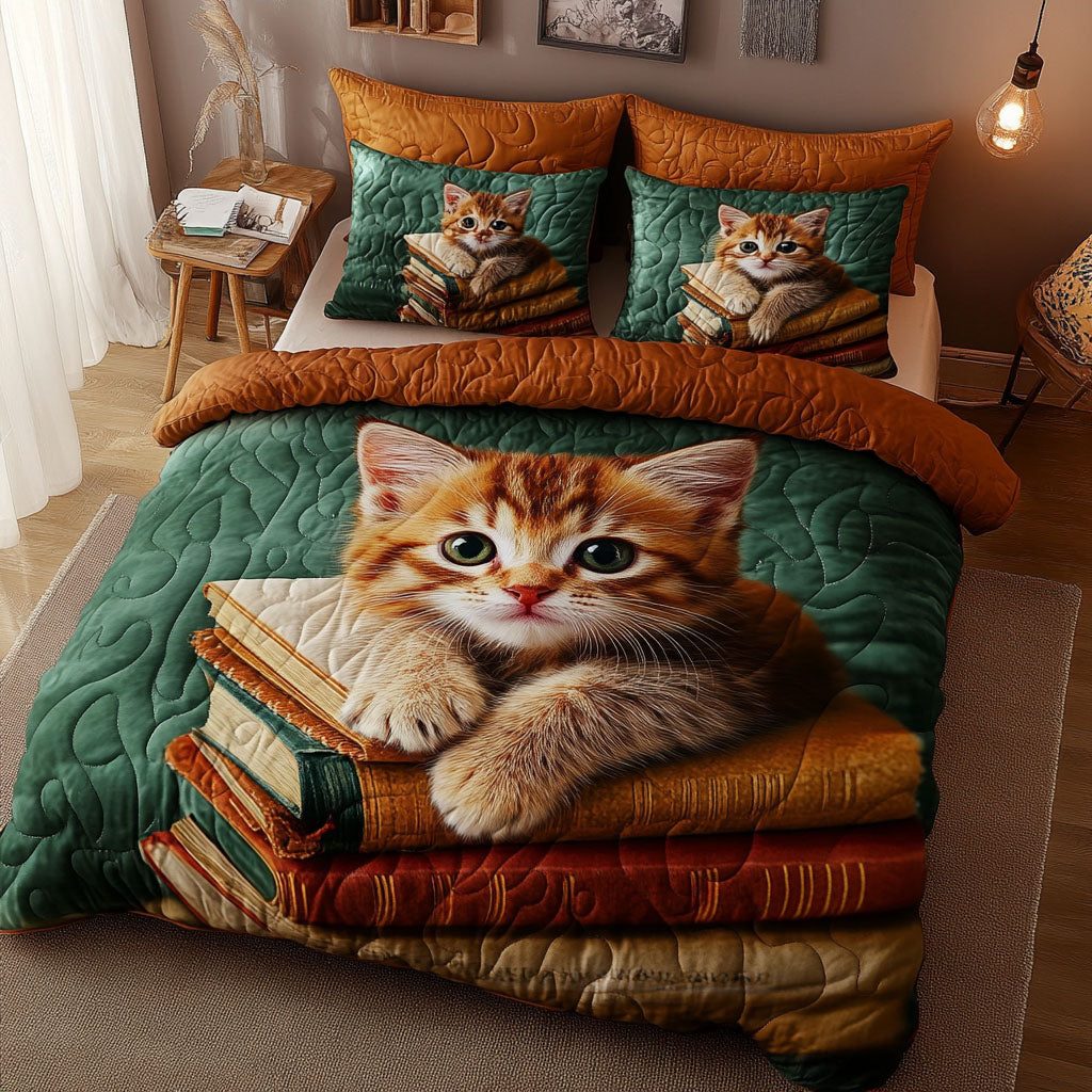 Kitten Chapters quilted 3-piece bedding set on a made bed with two matching pillow shams