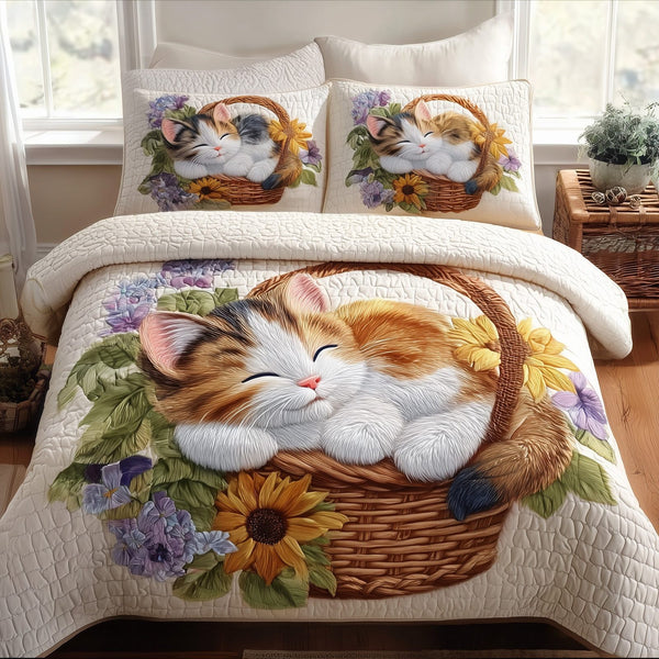 Kittens Garden quilted 3-piece bedding set on a made bed with two matching pillow shams