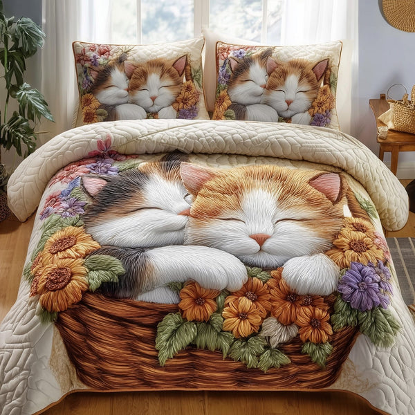 Kittens Garden quilted 3-piece bedding set on a made bed with two matching pillow shams