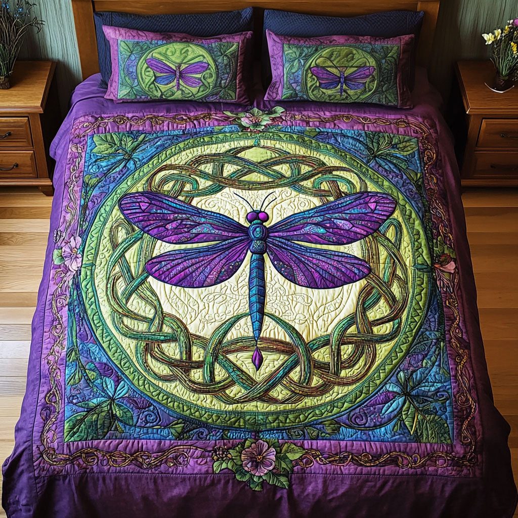 Knotted Grace quilted 3-piece bedding set on a made bed with two matching pillow shams