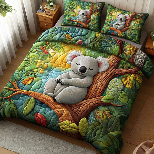 Koala Bliss quilted 3-piece bedding set on a made bed with two matching pillow shams