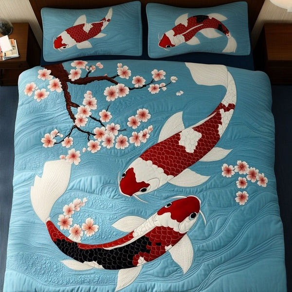 Koi Serenity quilted 3-piece bedding set on a made bed with two matching pillow shams