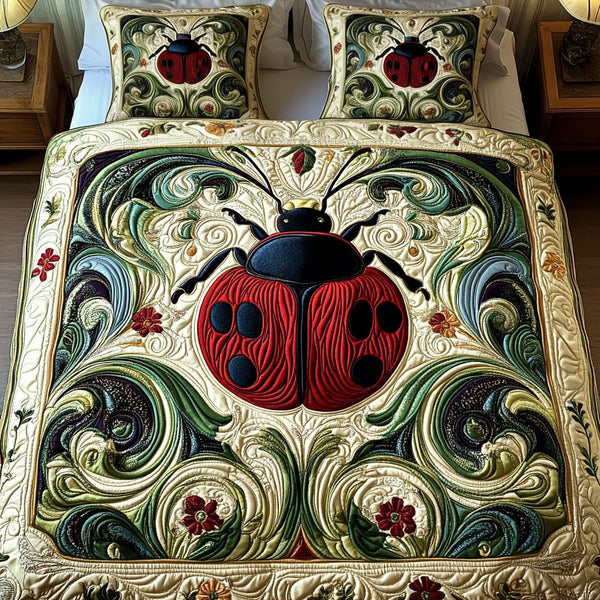 Ladybug Haven quilted 3-piece bedding set on a made bed with two matching pillow shams