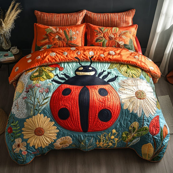 Ladybug Haven quilted 3-piece bedding set on a made bed with two matching pillow shams