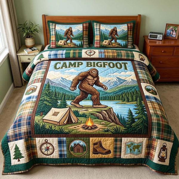 Lake Bigfoot quilted 3-piece bedding set on a made bed with two matching pillow shams
