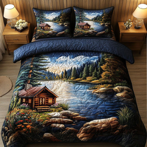 Lakefront Tranquility quilted 3-piece bedding set on a made bed with two matching pillow shams