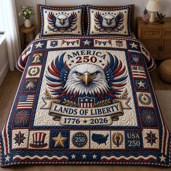 Land Of Liberty quilted 3-piece bedding set on a made bed in a warmly lit bedroom