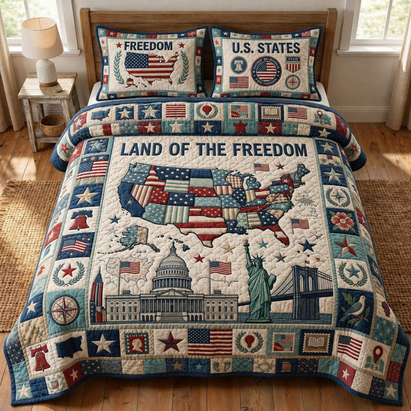 Land Of The Freedom quilted 3-piece bedding set on a made bed in a warmly lit bedroom