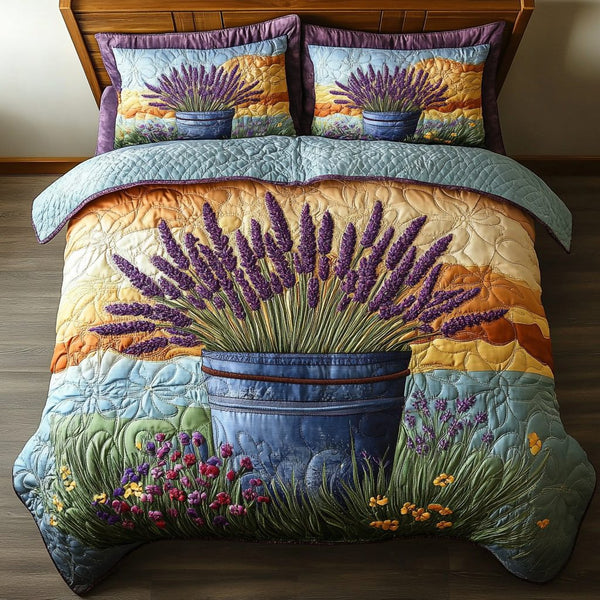 Lavender Breeze quilted 3-piece bedding set on a made bed with two matching pillow shams