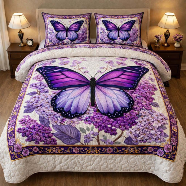 Lavender Butterfly Dream quilted 3-piece bedding set on a made bed with two matching pillow shams