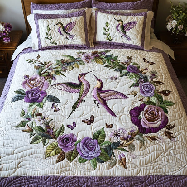 Lavender Flight quilted 3-piece bedding set on a made bed with two matching pillow shams