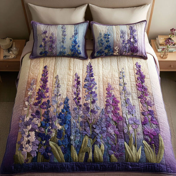 Lavender Haze quilted 3-piece bedding set on a made bed with two matching pillow shams