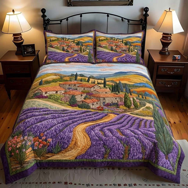 Lavender Village quilted 3-piece bedding set on a made bed with two matching pillow shams