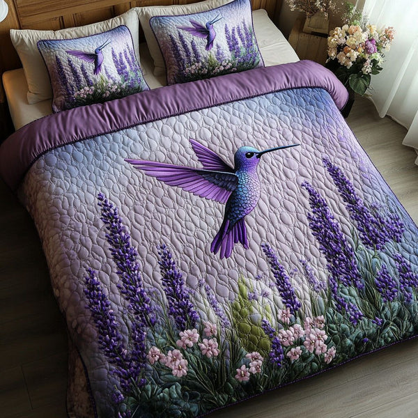 Lavender Whisper quilted 3-piece bedding set on a made bed with two matching pillow shams