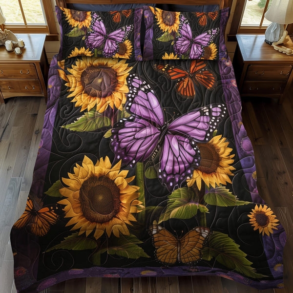 Lavender Wings Butterfly quilted 3-piece bedding set on a made bed with two matching pillow shams