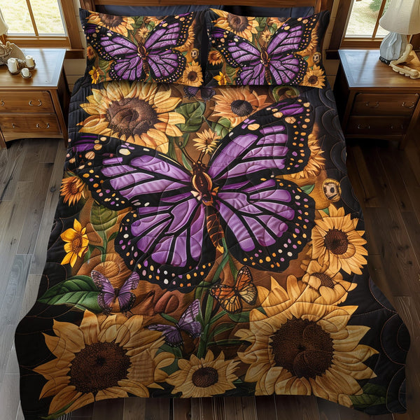 Lavender Wings Butterfly quilted 3-piece bedding set on a made bed with two matching pillow shams