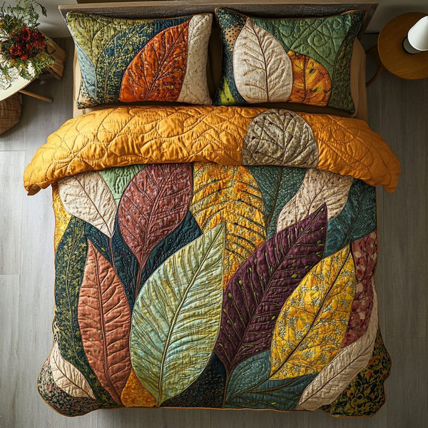 Leaf Breeze quilted 3-piece bedding set on a made bed with two matching pillow shams