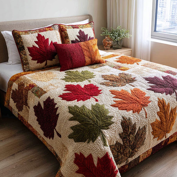 Leaf Harmony quilted 3-piece bedding set on a made bed with two matching pillow shams