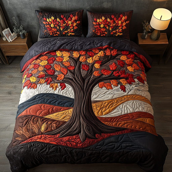 Leaf Harmony quilted 3-piece bedding set on a made bed with two matching pillow shams