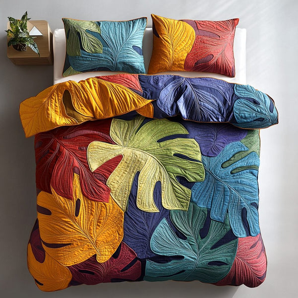 Leafy Charm quilted 3-piece bedding set on a made bed with two matching pillow shams