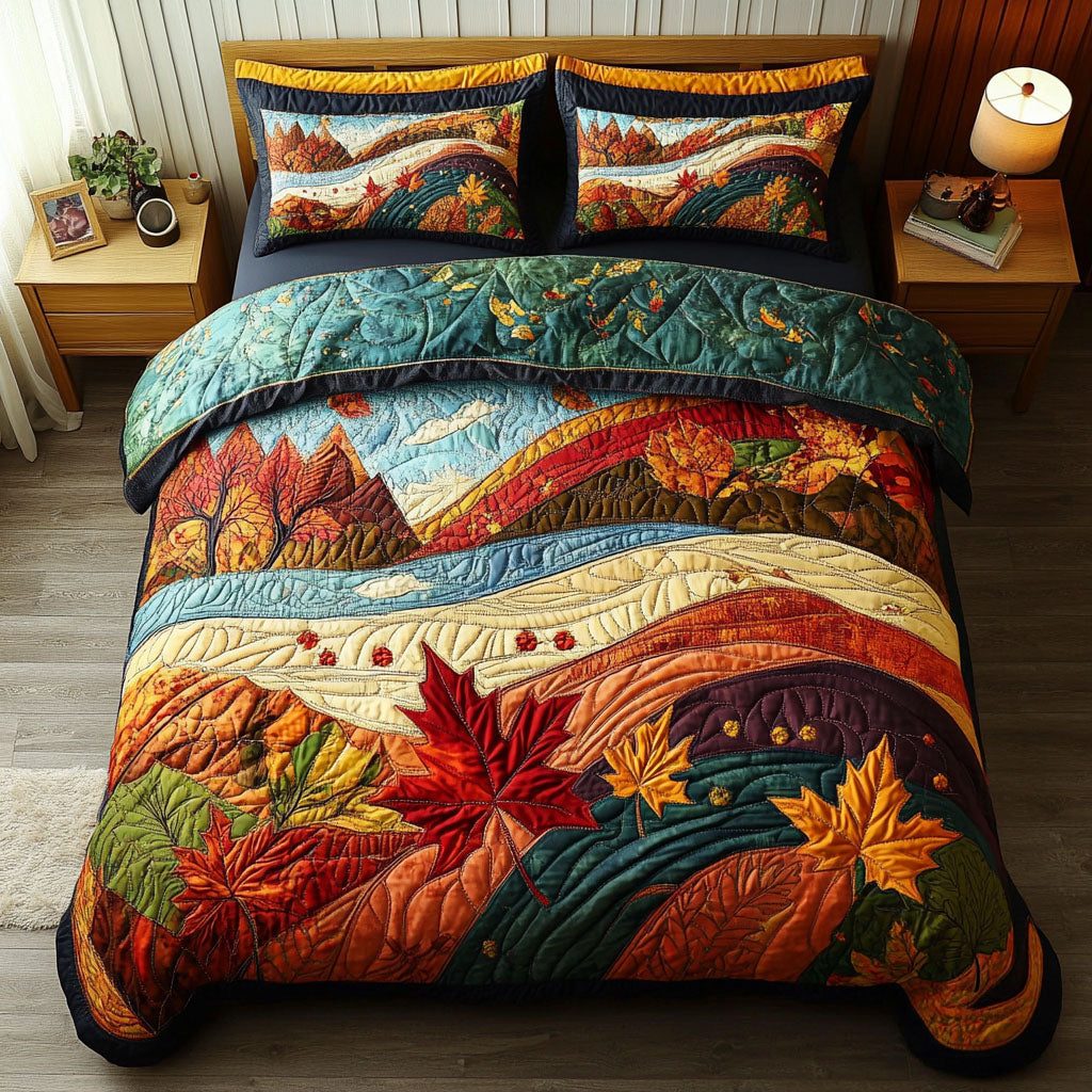 Leafy Lullaby quilted 3-piece bedding set on a made bed with two matching pillow shams