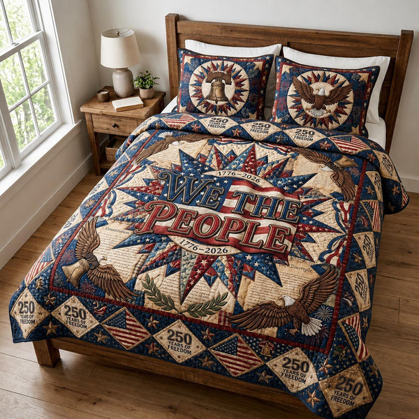 Legacy Stars quilted 3-piece bedding set on a made bed with two matching pillow shams