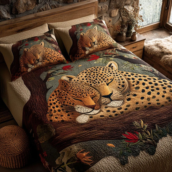 Leopard Romance quilted 3-piece bedding set on a made bed with two matching pillow shams