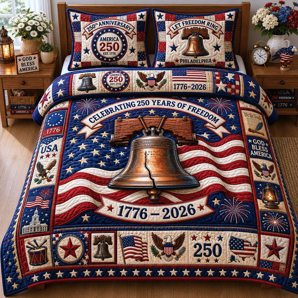 Let Freedom Ring Philadelphia quilted 3-piece bedding set on a made bed in a warmly lit bedroom