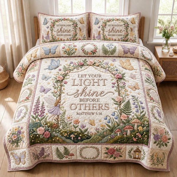 Let Your Light Shine quilted 3-piece bedding set on a made bed with two matching pillow shams