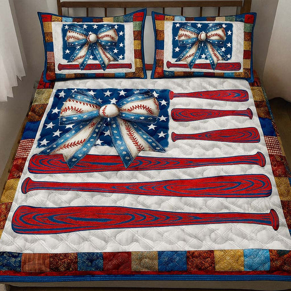 Liberty Baseball Bow quilted 3-piece bedding set on a made bed in a warmly lit bedroom