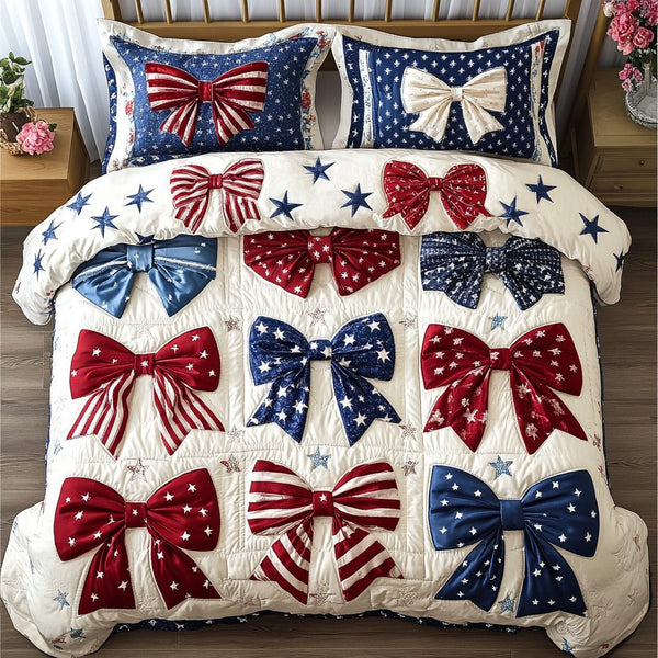Liberty Bow quilted 3-piece bedding set on a made bed in a warmly lit bedroom