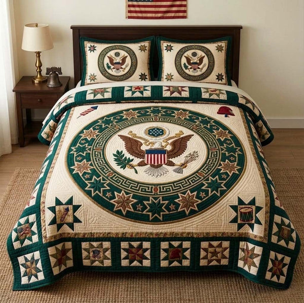 Liberty Circle Crest quilted 3-piece bedding set on a made bed in a warmly lit bedroom