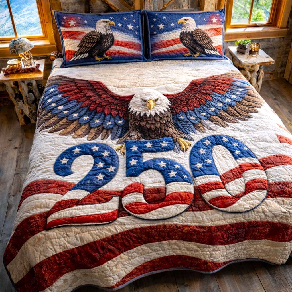 Liberty Colors quilted 3-piece bedding set on a made bed in a warmly lit bedroom