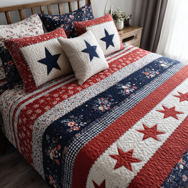 Liberty Dream quilted 3-piece bedding set on a made bed in a warmly lit bedroom