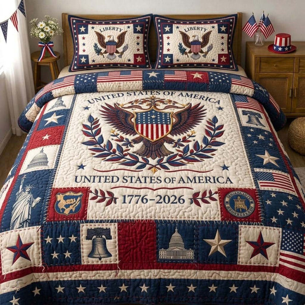 Liberty Eagle Crest quilted 3-piece bedding set on a made bed in a warmly lit bedroom