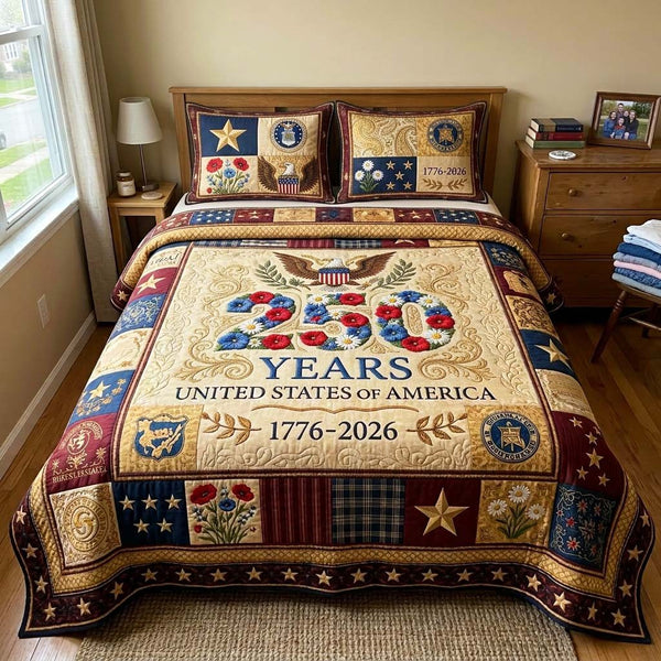 Liberty Eagle quilted 3-piece bedding set on a made bed in a warmly lit bedroom