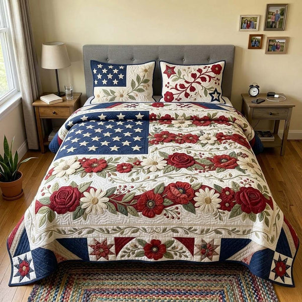Liberty Garden quilted 3-piece bedding set on a made bed in a warmly lit bedroom
